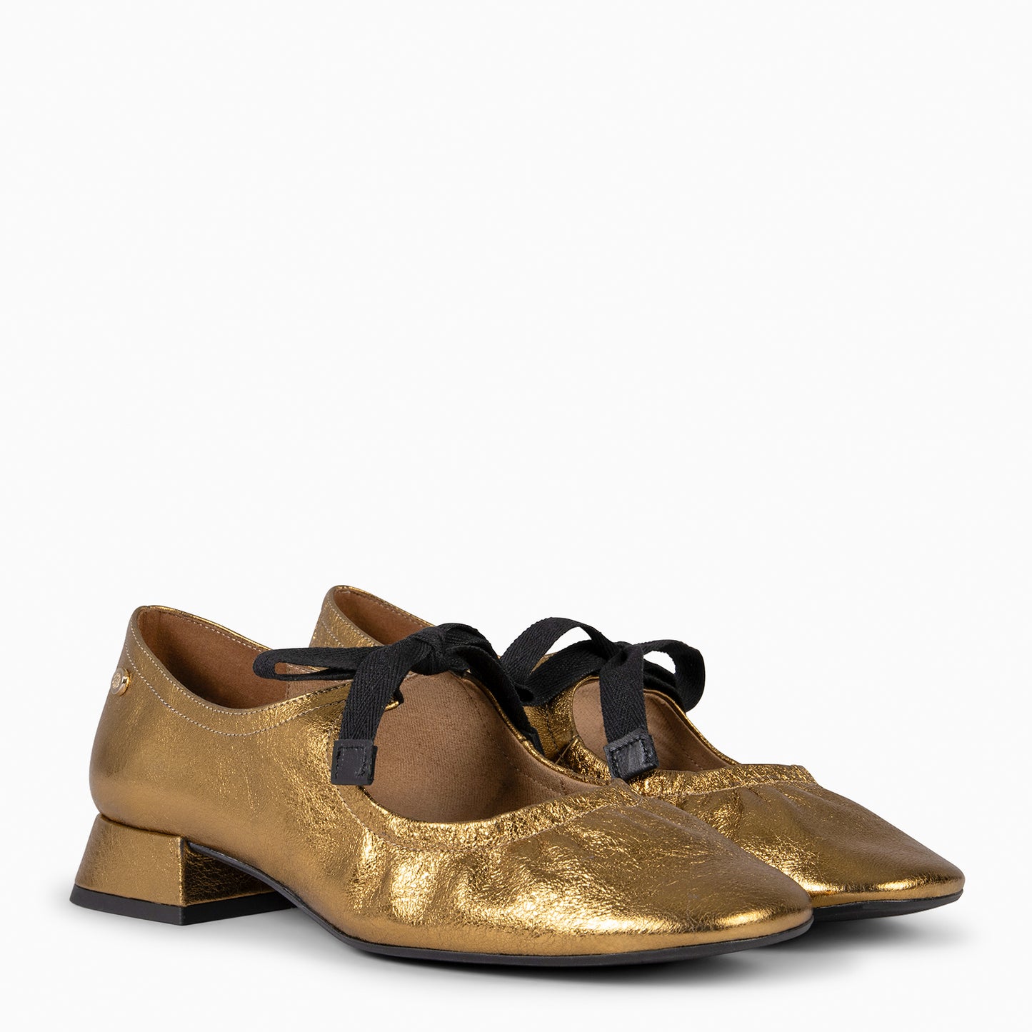 CORA– Merceditas con lazo BRONCE