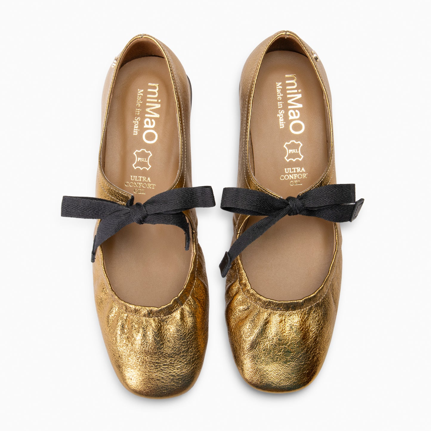 CORA– Merceditas con lazo BRONCE