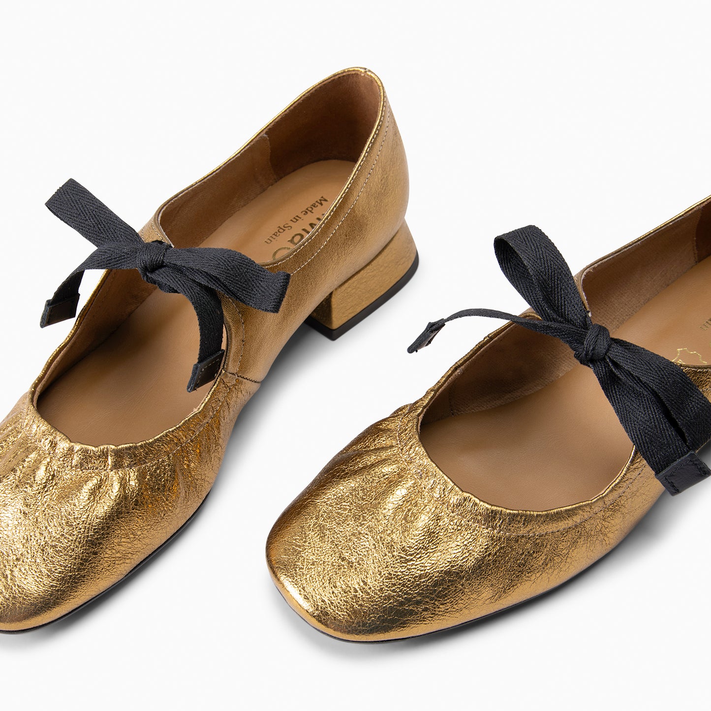 CORA– Merceditas con lazo BRONCE